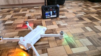 Prodám 2drony FIMI x8 SE 2022, a FIMI x8 Tele Max za - - 4