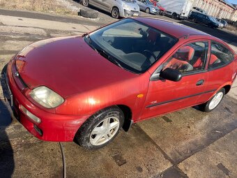 Mazda 323 - 4