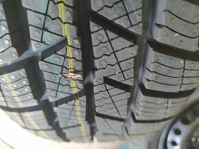 Prodám zimní komplet disku škoda Fabia IV 5x100 r15 - 4
