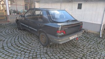 Peugeot 309 - 1.4 55kW - 4