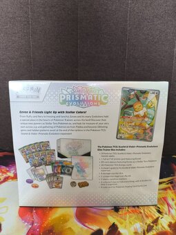 Prodám Elite Trainer box Prismatic evolutions sealed škozený - 4