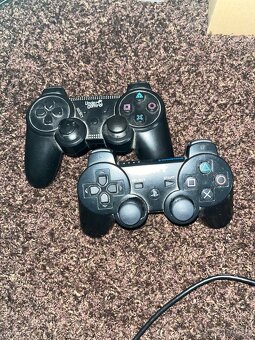 Prodám PS3 konzoli a dva dualshocky + hry - 4