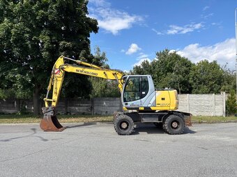 Kolové rypadlo / nakladač New Holland MH CITY - 4