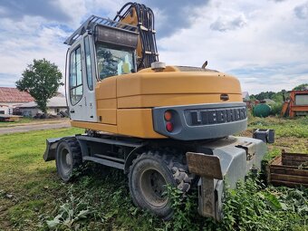 Kolové rypadlo LIEBHERR 312 kolový bagr LIEBHERR A312 - 4