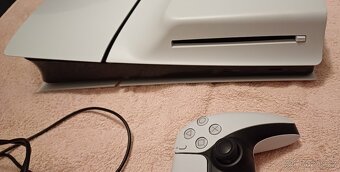 PS5 Slim s mechanikou v záruce do 7.8.2026 - 4