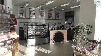 nájem prodejny 100 m2 v přízemí obchodního domu Špalíček v O - 4