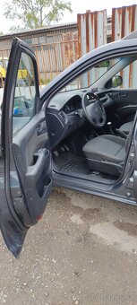 Kia Sportage - 4