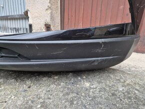 Škoda Karoq - přední nárazník, chladičovka.
- 4
