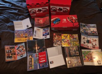 Prodám Nintendo Switch + 2xvolant a 15 her - 4