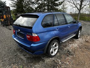 BMW X5 4.6is Estoril blau - 4