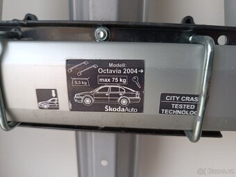 Střešní nosiče (příčníky) Octavia 2004 + 4x nosiče kol Menab - 4