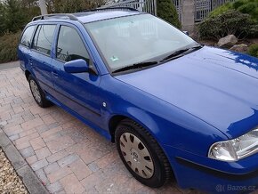 Skoda Octavia combi tour 1.6-75kw,rok 2005,org.km,stk - 4