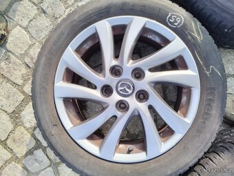 al. disky 5x114,3 R16 original MAZDA - 4