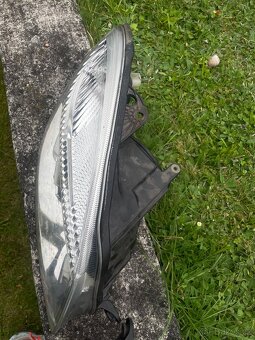 Přední světla Škoda Fabia II / Škoda Roomster Hella - 4