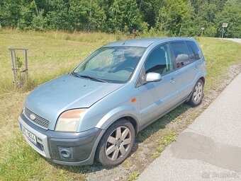 Ford Fusion + - 4