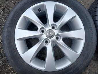 Prodám sadu Orig ALU kol Opel 185/55R15 letní - 4