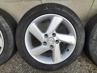 Orig. sadu kol z Mazdy 6 s pneu 205 55 R16, cena 4000,- - 4