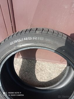 Prodám zimní pneu Nokian 235 x 45 R18 98V XL - 4