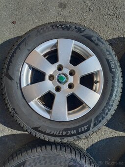 Kola Škoda Octavia II 5x112 R15 - 4
