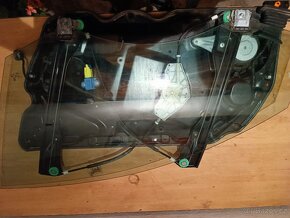 Přední stahovačka dveří Vw. Passat B6 kombi - 4