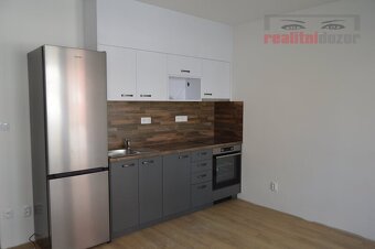 Pronájem částečně zařízeného bytu 1+kk  s balkonem, ul. Hlin - 4