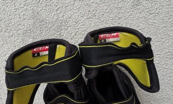 Chrániče loktů CCM Tacks JR, vel. M - 4
