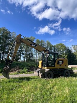 Kolové rypadlo CAT 314F - 4