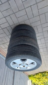 Alu disky Ford (Ronal) 5,5Jx14H2 s pneu Uniroyal - 4