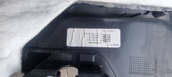 Tapecir předních levych dverí F150. F-150 2760505xr4 - 4