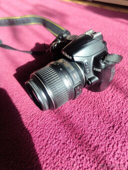 Nikon D3000 + objektiv AF-S NIKKOR 18-55mm - 4