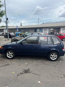 Suzuki Swift 1.3 GLX 63kw - 4