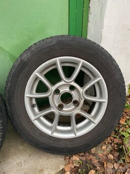 Originální Alu kola Ford - 175/70 R14 4x108 - 4
