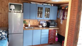 Staveb.pozemek s chatkou - 4
