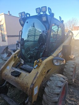Smykovy nakladac CAT 256C - 4