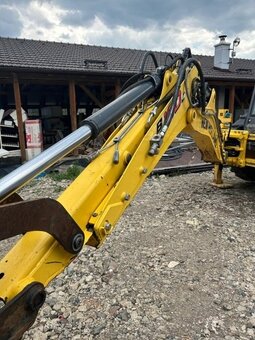 Traktorbagr New Holland B100C TC - 4