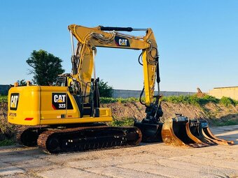 Pásové rypadlo Caterpillar 323 - 4
