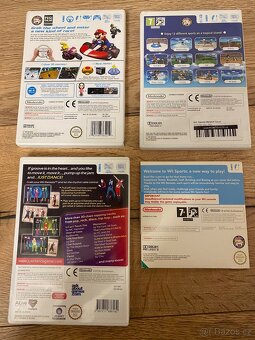 Herní konzole Nintendo Wii s příslušenstvím + 4 hry - 4