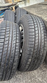 Letni pneu na alu 165 / 70 / 13 - 4