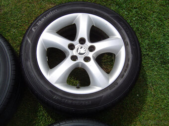 4XLETNÍ HLINÍKOVÁ KOLA ŠKODA FABIA III,IV ,RAPID 195/55 R15 - 4