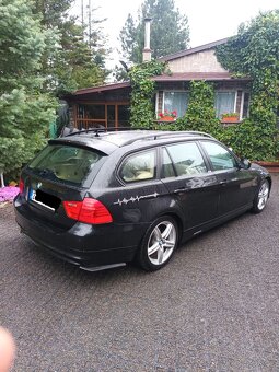 BMW E91 318 D LCI - 4