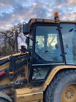 CAT 428D - 4
