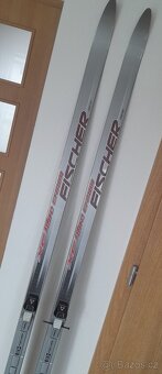 Běžky Fischer s vázáním SNS + hůlky, d. 183 - 4