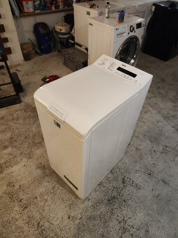 Vrchem plněná pračka AEG - 4