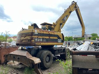 CAT M318 - 4