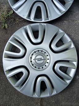 Poklice Opel r15 - 4