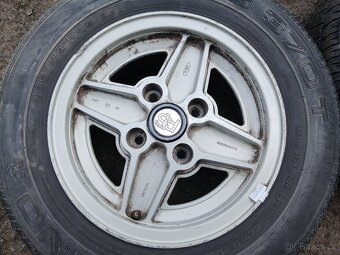 Prodám sadu Orig ALU kol Ford 185/70R13 letní - 4
