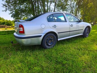 Škoda octavia 1.6 75 kw - 4