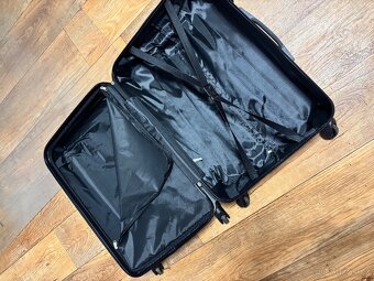 Cestovní kufr 70l, mírně poškozen - 4