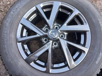 Prodám sadu Orig ALU kol Mazda 215/65R16 zimní - 4