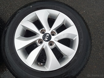 4x100 Kia Rio 5,5Jx15" ET36 č. 52910-1W650 alu disky - 4
